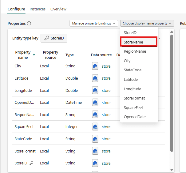 The Store Configure page: entity type key StoreID, every property bound to the store data source, and the Choose display name property menu open with StoreName highlighted